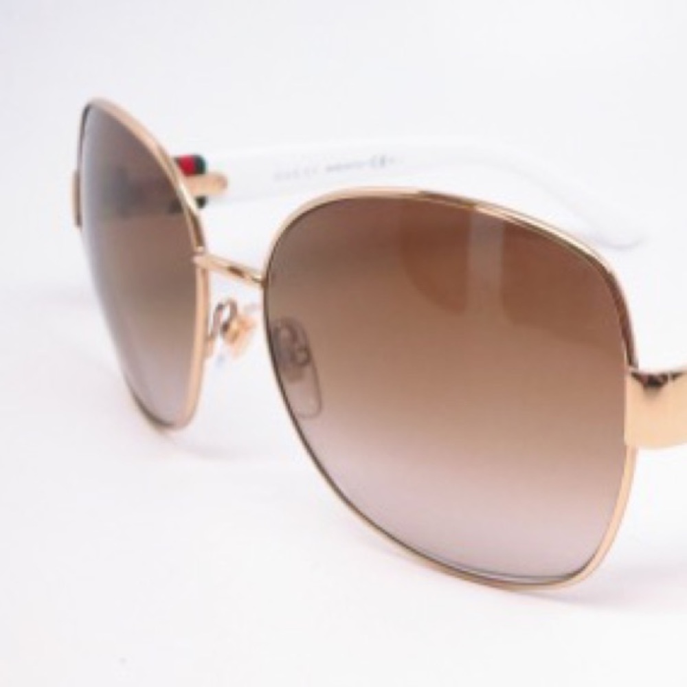 Gucci sunglasses gold/white gently worn CE BL2/ GG 4242/S 2456Y